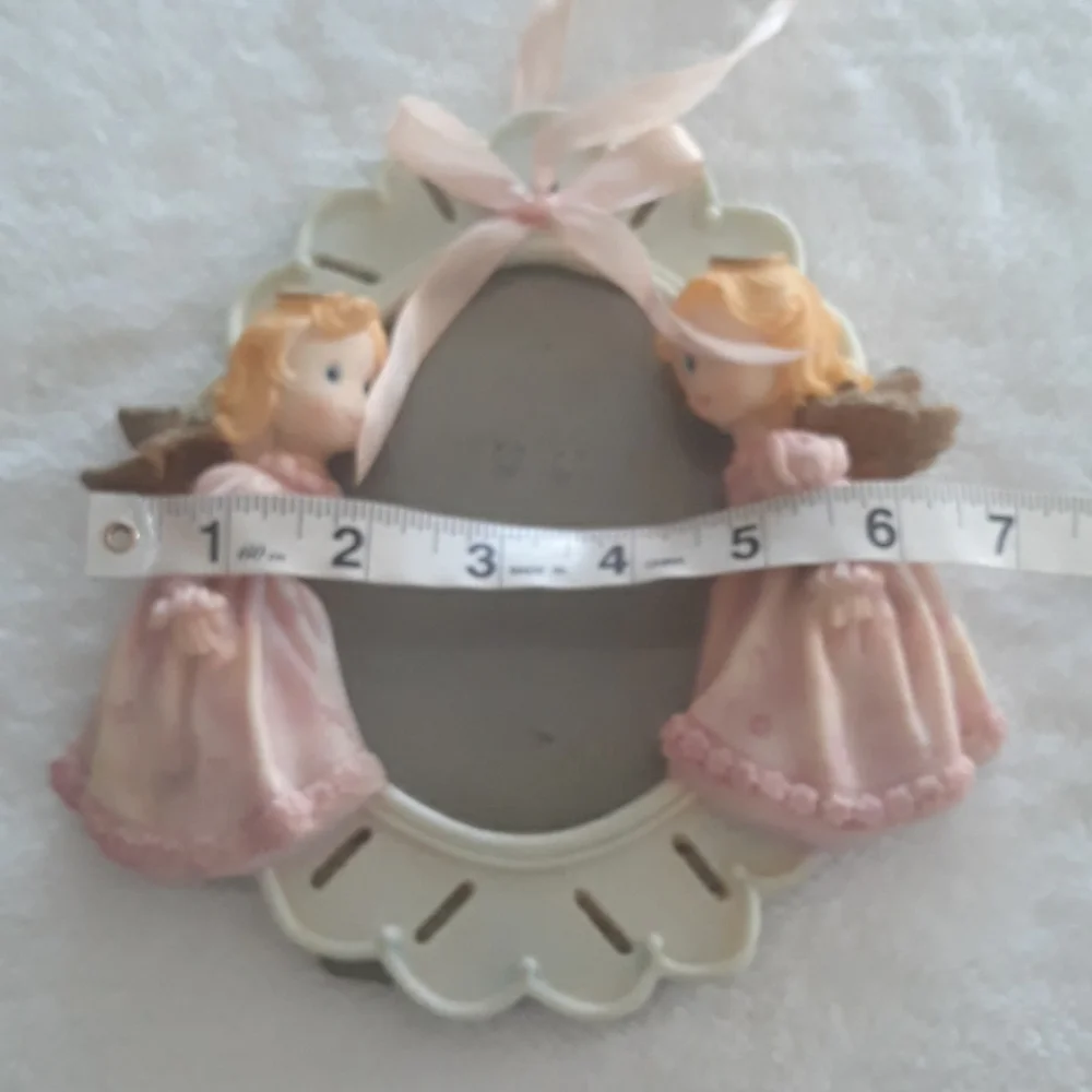 Angel photo frame with pink ribbon